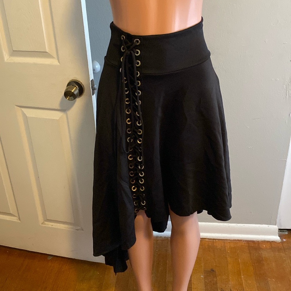 Tauch me women black skirt with lace up string down the right side.